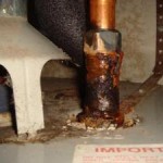 Rusty water heater piping can cause leaks